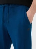 Spodnie dresowe joggery męskie 4F 4FWMM00TTROM1139 morskie
