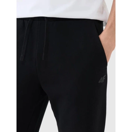 Spodnie dresowe joggery męskie 4F 4FWMM00TTROM1139 czarne