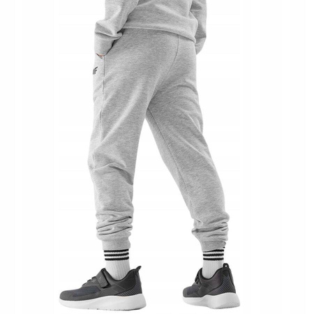 Spodnie dresowe chłopięce jasny szary 4F JWSS24 TTROM591